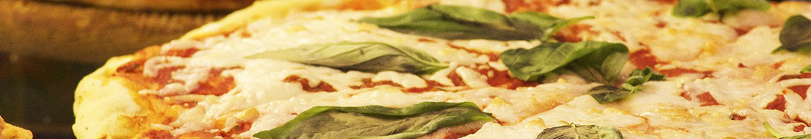 Eating Italian Pizza at Sicily's Pizza & Pasta restaurant in McKinney, TX.